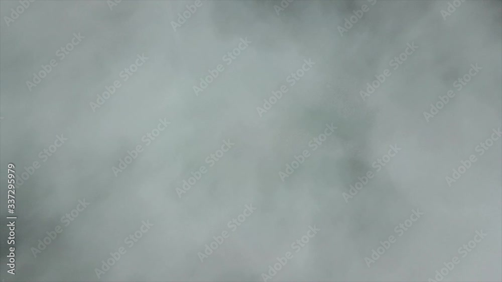 Misty Mountainside revealed through Clouds, Aerial 4K