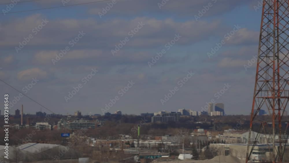 Houses And Buildings Along With Electric Arch Under The Cloudy Weather. -wide shot Houses And Buildings Along With Electric Arch Under The Cloudy Weather. -wide shot
