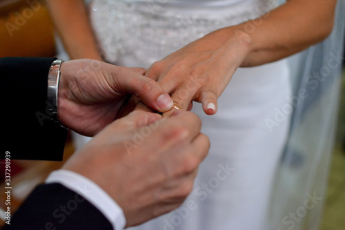 bride and groom with their rings