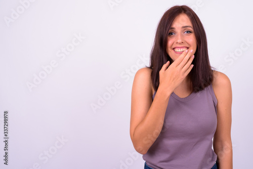 Portrait of happy young beautiful woman laughing