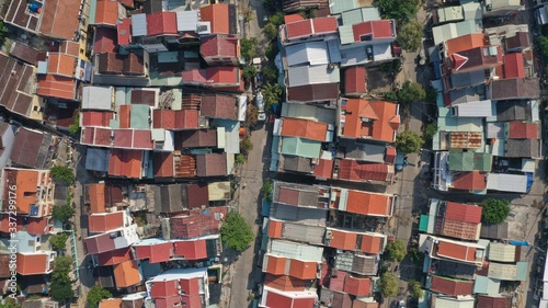 Aerial top down view of Vetnamese houses roof tops in Hoi An old town, Quang Nam province, Vietnam.