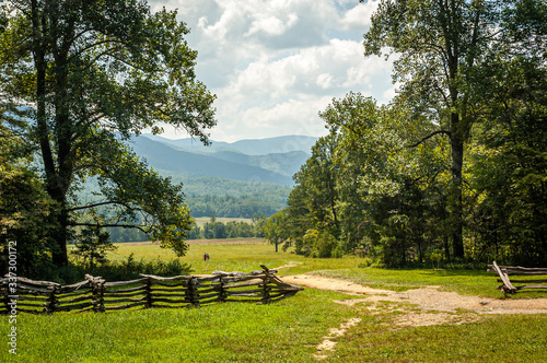 Photography Smokey Mountains fenced field on a summer day.