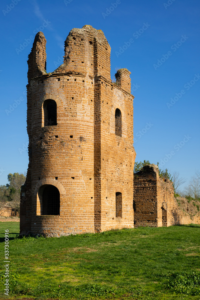 One of the towers at the entrance to the Circus of Emperor Maxentius. This large archaeological site is located along the Via Appia Antica an important commercial street of ancient Italy. Rome. One of the towers at the entrance to the Circus of Emperor Maxentius. This large archaeological site is located along the Via Appia Antica an important commercial street of ancient Italy. Rome.
