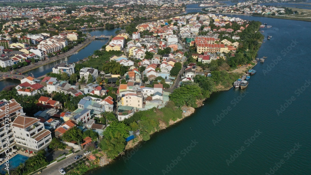 Aerial view of Hoi An old town on Thu Bon river, Quang Nam province, Vietnam. Unesco world heritage. River bifurcation.