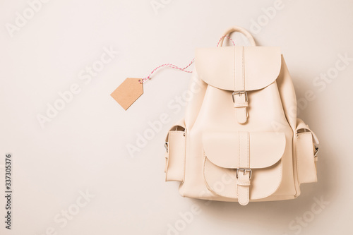 White leather backpack and blank tag (label) - fashion accessories