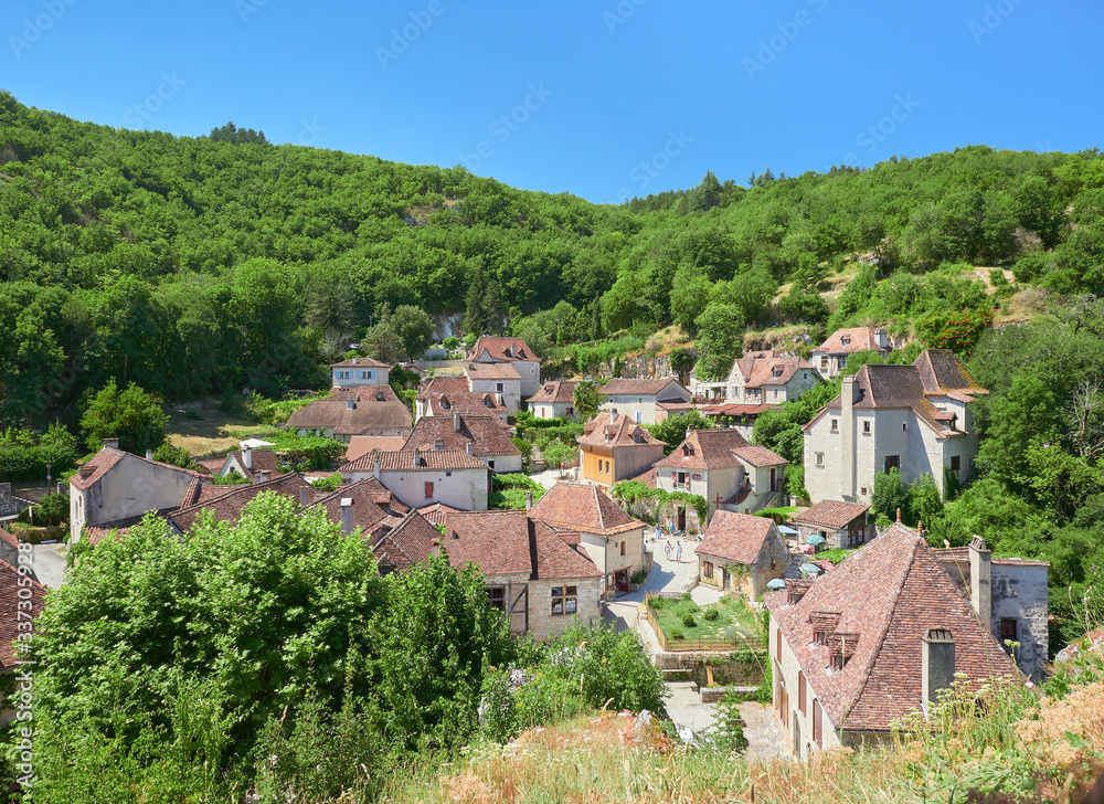 Landscape view of the old town streets of Saint-Cirq-Lapopie, one of the most beautiful villages in France (Les Plus Beaux Villages de France), Lot River valley, Causses du Quercy Natural Park