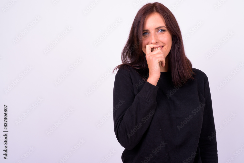 Portrait of happy young beautiful woman thinking Portrait of happy young beautiful woman thinking