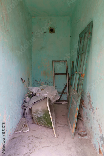 old abandoned damaged house bathtube