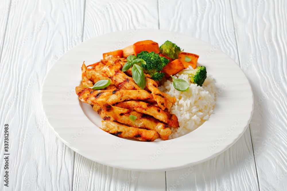 grilled paprika chicken strips with yams, rice