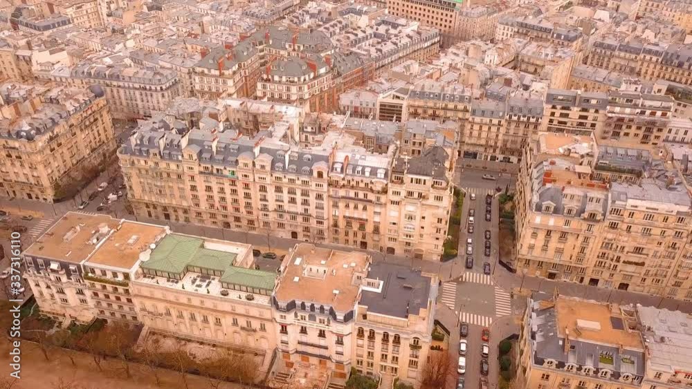 Flying above Paris buildings and streets..