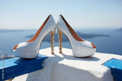 white shoes with a view of the sea and sky.