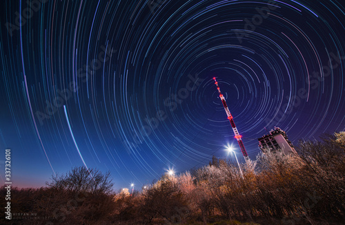 Night sky star trail over the television mobile radio tower © Krisztin