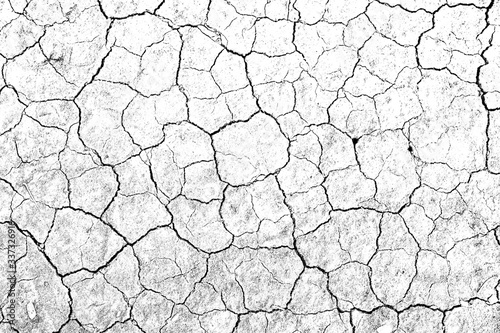 Texture soil dry crack background pattern of drought lack of water of nature white black old broken.