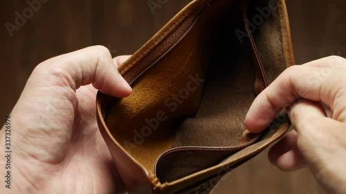 Man bankrupt arrears showing empty wallet with no money. Poverty finance business bankruptcy concept. Male debt businessman showing empty wallet. Financial crisis of getting into debt. no money on photo