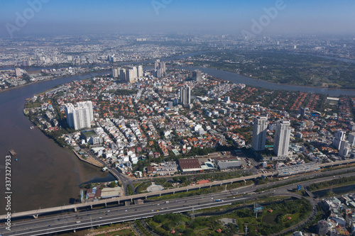 Top view aerial photo from flying drone of a Ho Chi Minh City with development buildings  transportation  energy power infrastructure