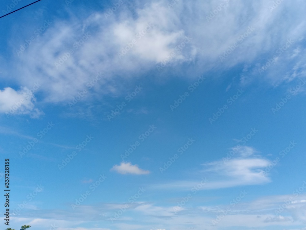 white clouds with blue sky