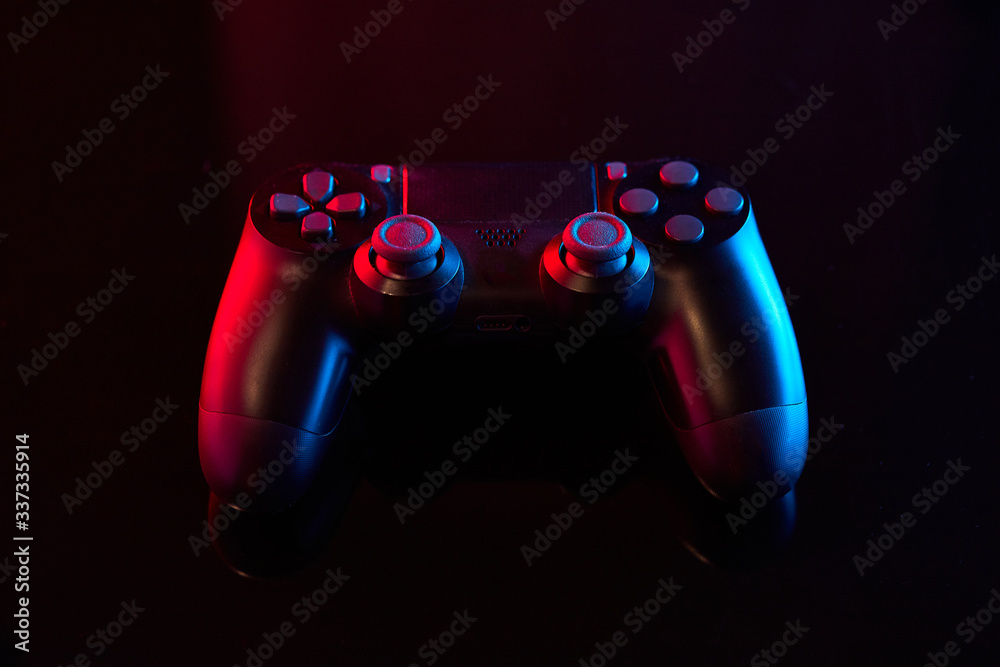 Sony Playstation 4 (PS4) DualShock 4 controller, joystick or gamepad on a table. Close up studio shot. Game concept Stock-foto | Adobe Stock