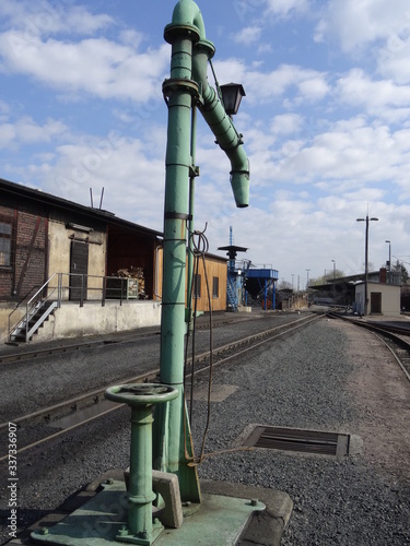 historischer Betriebshof mit Wasserkran photo