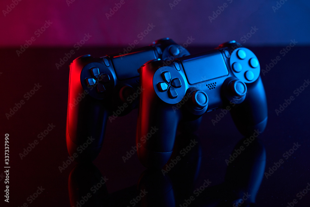 Sony Playstation 4 (PS4) DualShock 4 controller, videogame joystick or  gamepad on a table. Close up studio shot. Game concept Stock 写真 | Adobe  Stock