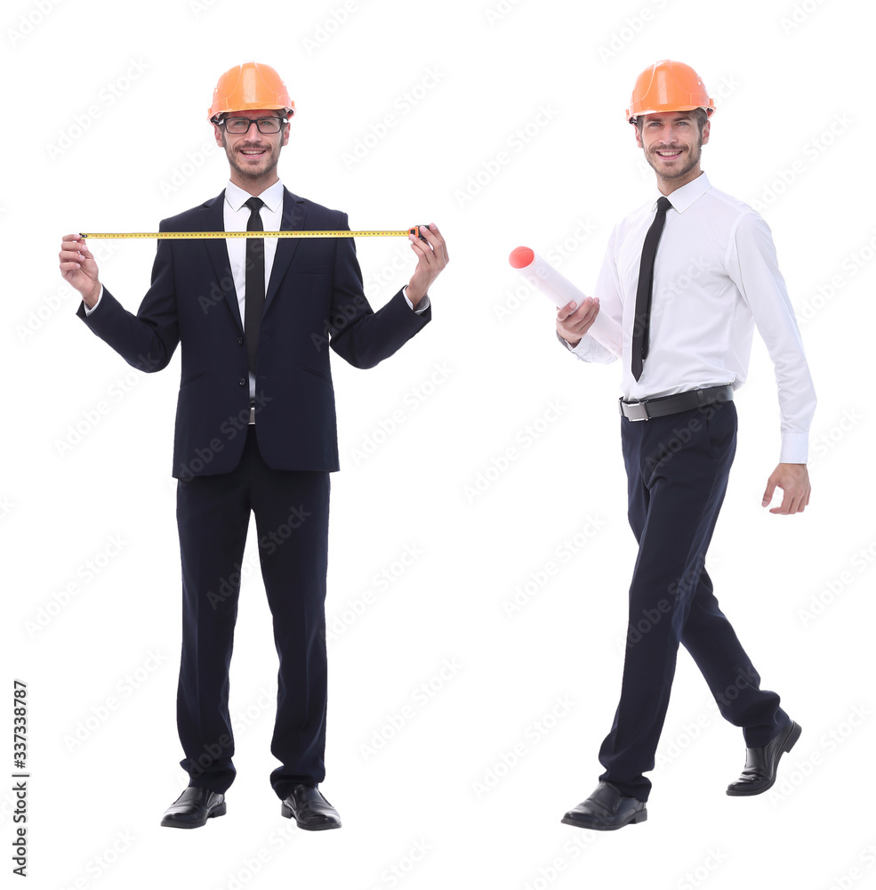 full-length .architect in orange helmet with drawings for new project. full-length .architect in orange helmet with drawings for new project.