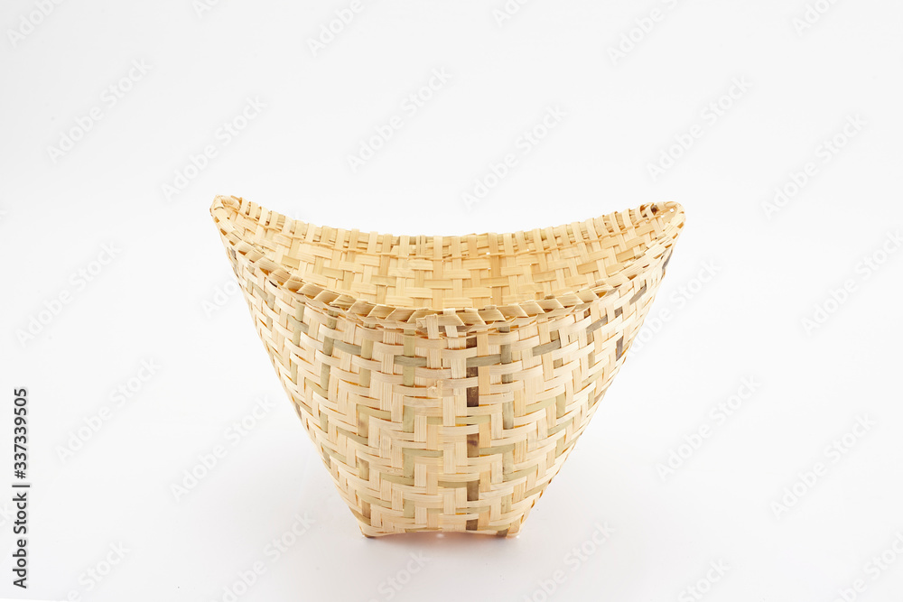 Obraz premium wicker basket on a white background