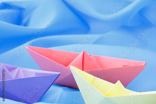 Free Download paper boats on a blue background - GFXLoad