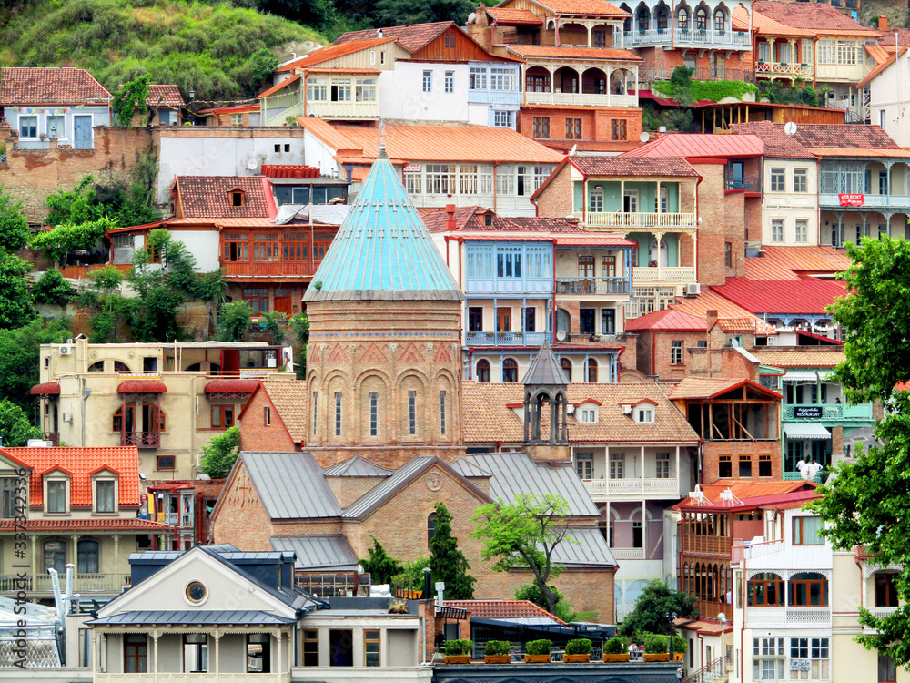 View of the old part of Tbilisi. Ancient buildings with multi-colored roofs