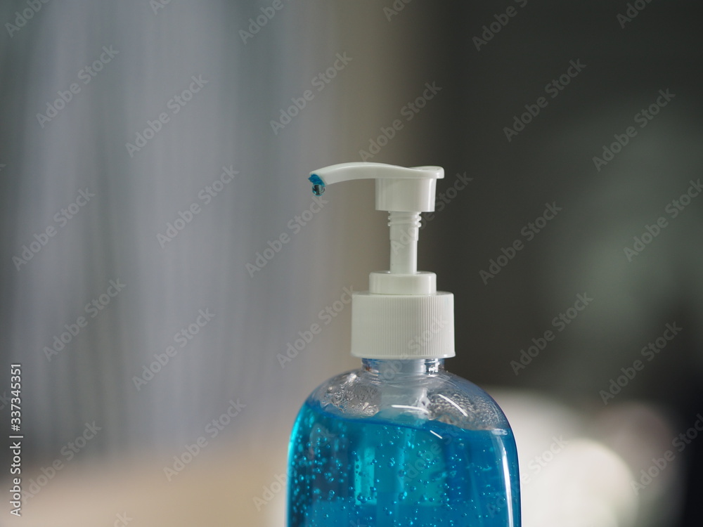 Hand Sanitizer, gel alcoholic mixture with gelatin in clear Plastic bottle with pump pushing wash clean dirty to prevent germs protect Contagious disease corona virus, covid-19 Hand Sanitizer, gel alcoholic mixture with gelatin in clear Plastic bottle with pump pushing wash clean dirty to prevent germs protect Contagious disease corona virus, covid-19
