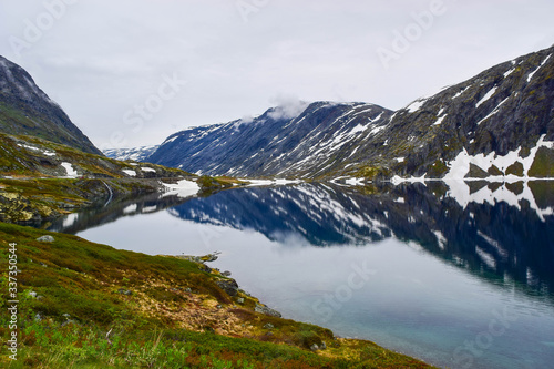 The lake with pure meltwater, formed as a result of melting snow and glacier. Global warming, climate change.
