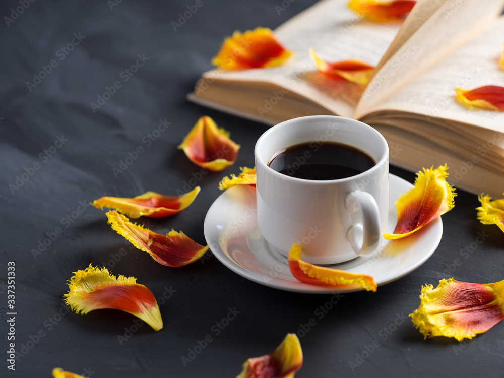 Read a book over a Cup of coffee in the morning. Spring mood