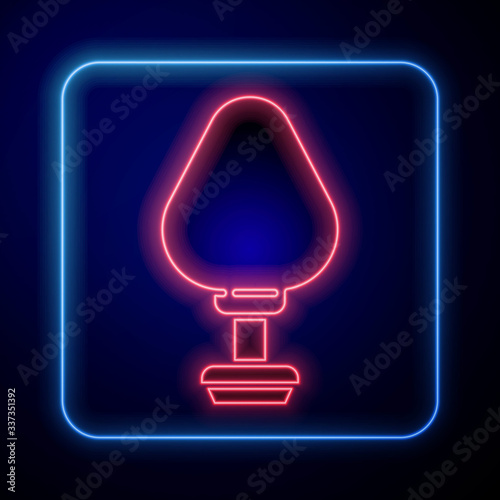 Glowing neon Anal plug icon isolated on blue background. Butt plug sign. Fetish accessory. Sex toy for men and woman. Vector Illustration