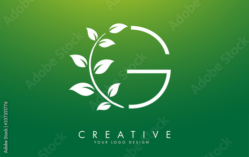 White Leaf Letter G Logo Design with Leaves on a Branch and Green Background. Letter G with nature concept.