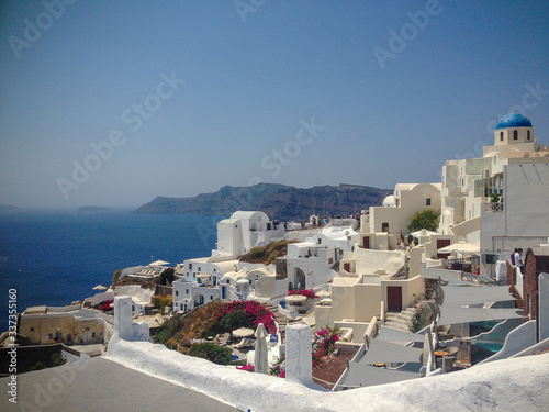 Santorini, Greece - September 10: Traditional white houses overlooking the Mediterranean Sea in Oia, Santorini, Greece. Another perspective.