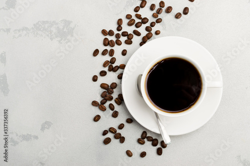 cup of black coffee on a light background