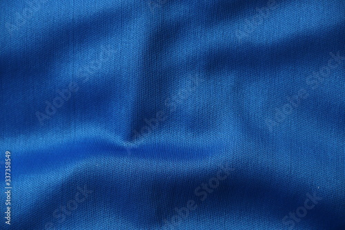 textura textil azul brillante con reflejos de luz