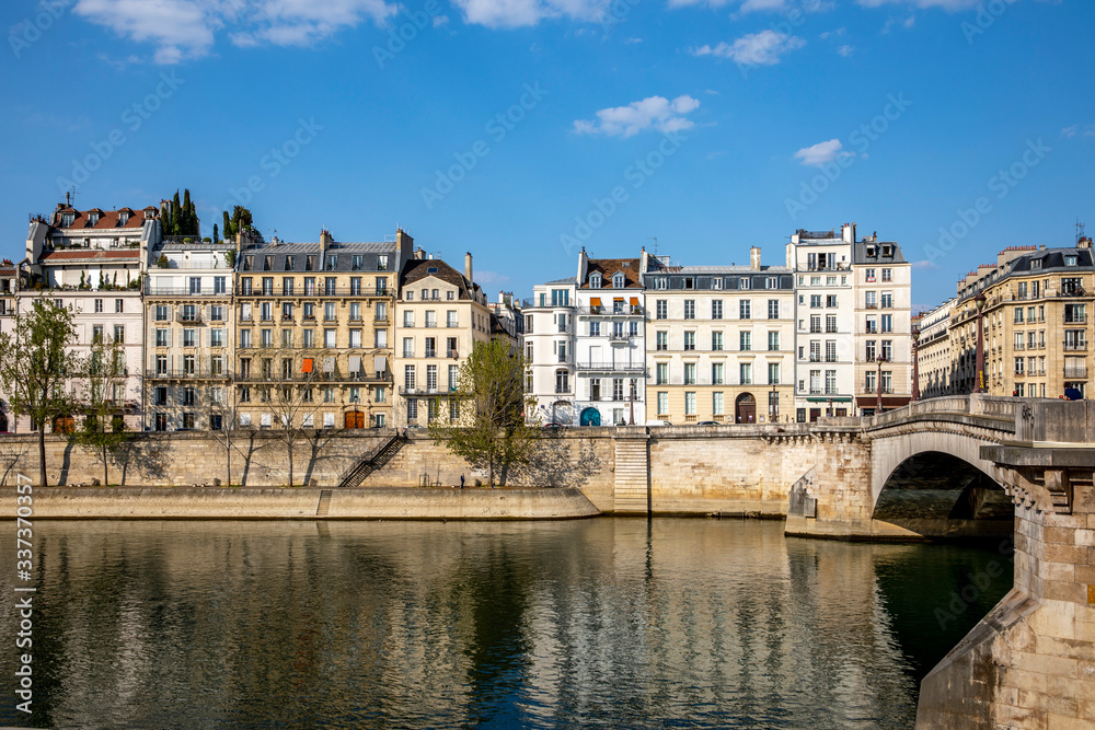 Paris, France - April 9, 2020: Typical Haussmannian buildings on the Ile Saint Louis during containment measures due to covid-19