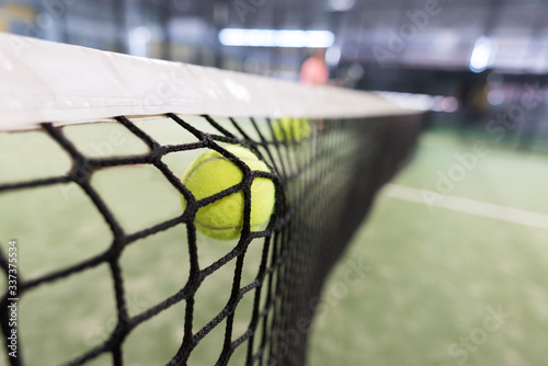 Ball shot versus the net, paddle tennis image.  © FotoAndalucia
