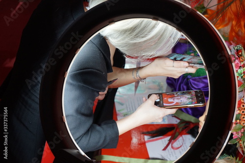 woman changing car wheel