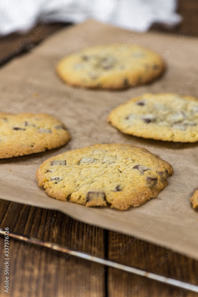 Portion of fresh Chocolate Chip Cookies (selective focus; close-up shot)