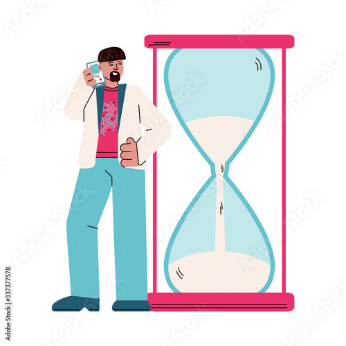 Man with smartphone looking at time left on giant hourglass