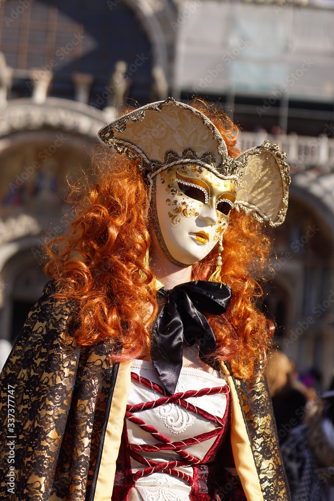 VENICE / ITALY - February 6 2016: Carnival performers participate this event in Piazza San Marco in Venice, Italy. The tradition began in 1162 to celebrate the defeated Ulrico, Patriarch of Aquileia VENICE / ITALY - February 6 2016: Carnival performers participate this event in Piazza San Marco in Venice, Italy. The tradition began in 1162 to celebrate the defeated Ulrico, Patriarch of Aquileia