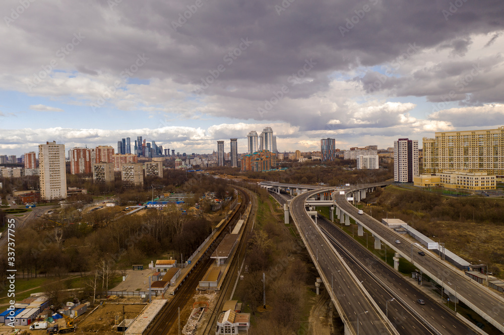 fantastic clouds over a frozen city isolated from a drone