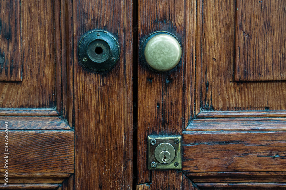 Old wooden door with door knob Old wooden door with door knob