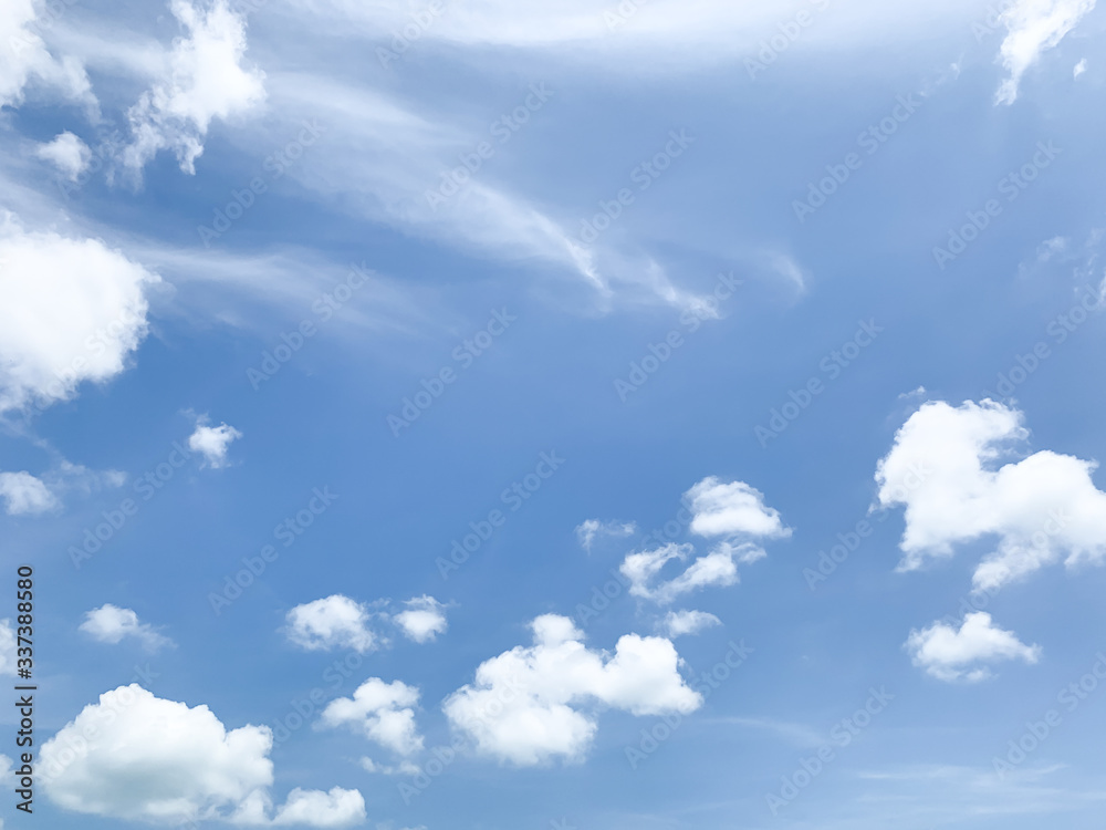 Bright blue sky Covered with clouds in the sky Giving a fresh feeling Summer is coming Perfect for relaxing on the beach, sunbathing, traveling, summer travel ideas.