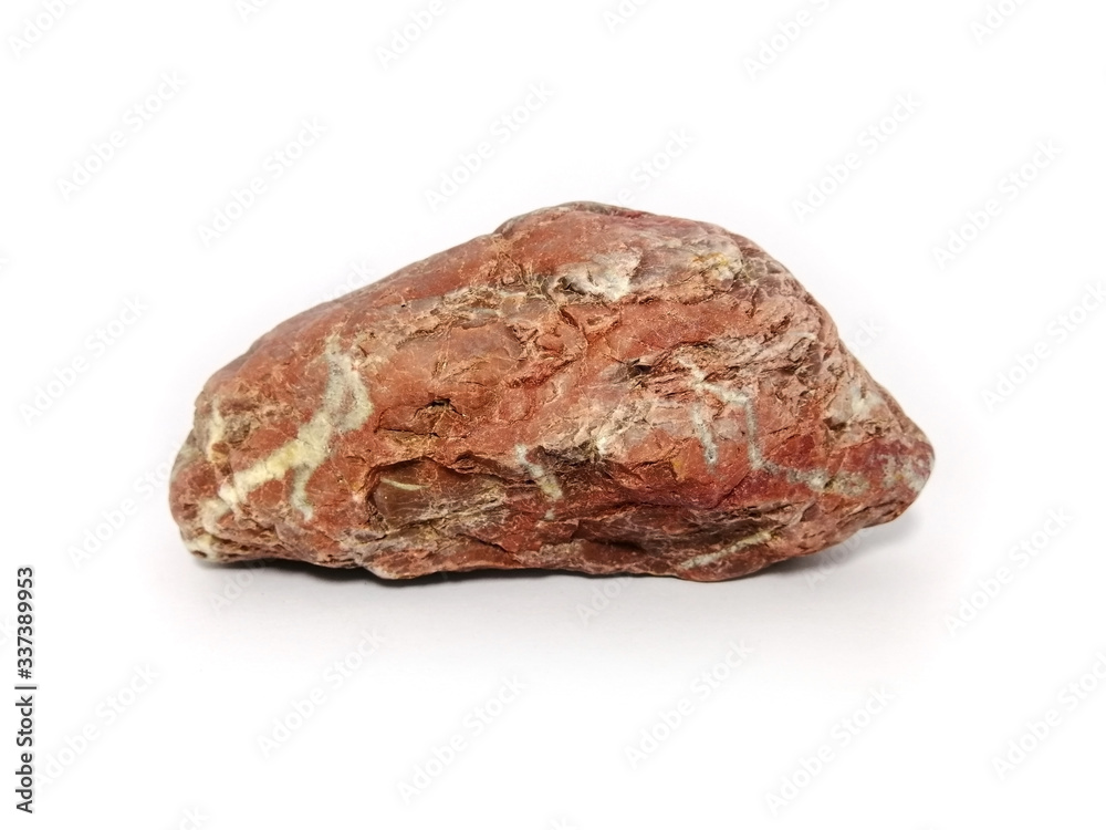 Jasper stone and quartz veins on white background. red stone, Jasper stone is an aggregate mineral commonly used in New Age practices and in feng shui. Jasper stone and quartz veins on white background. red stone, Jasper stone is an aggregate mineral commonly used in New Age practices and in feng shui.