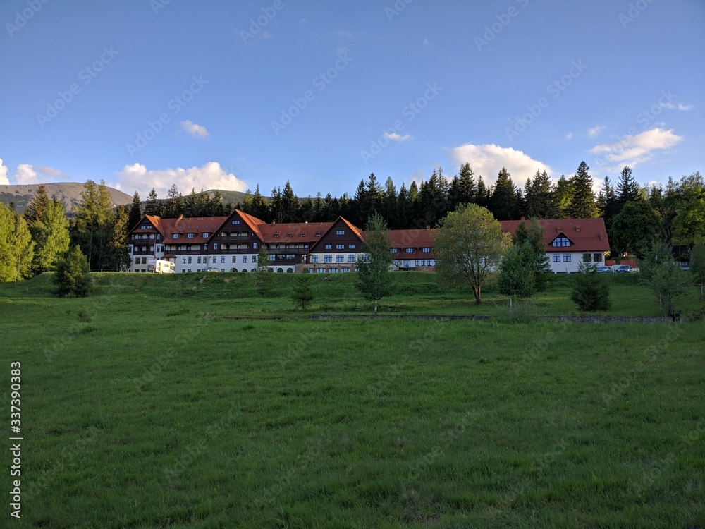 Green grass and a house in Karpacz in Poland Green grass and a house in Karpacz in Poland