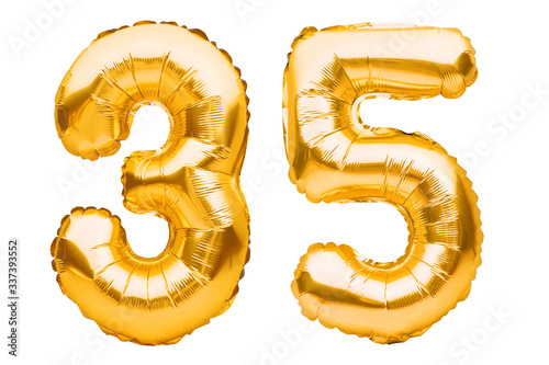 Number 35 thirty five made of golden inflatable balloons isolated on white. Helium balloons, gold foil numbers. Party decoration, anniversary sign for holidays, celebration, birthday, carnival