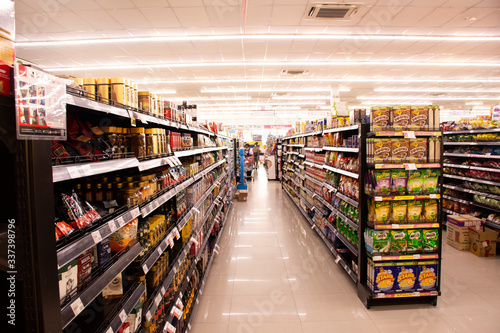 Thai people working and walking select buy product from shelf in supermarket department store and mall at Nonthaburi city on April 10, 2020 in Bangkok, Thailand