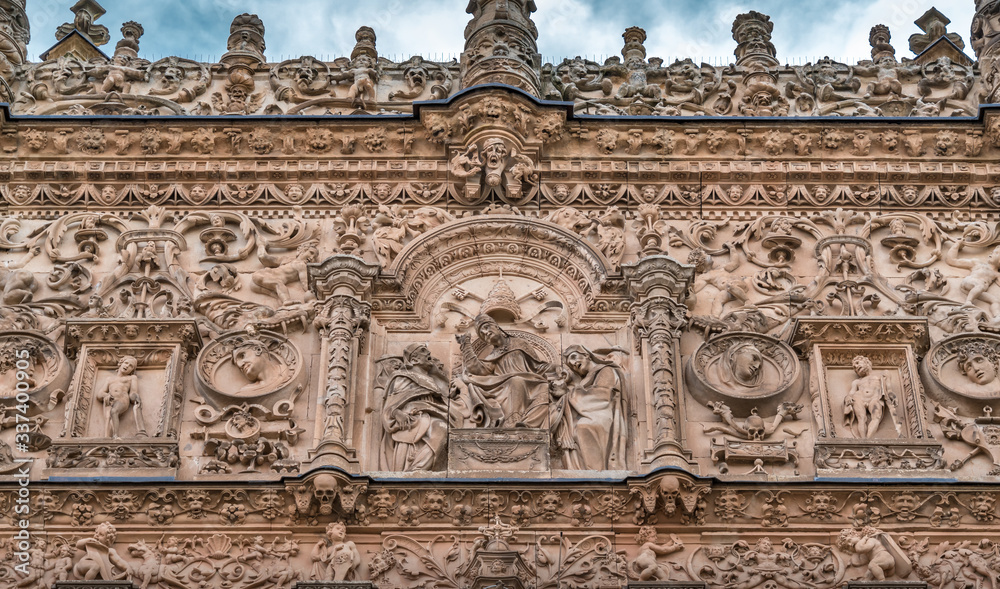 Panoramic detail view of plateresque style exterior facade of University of Salamanca. UNESCO World Heritage Site. Salamanca, Spain.