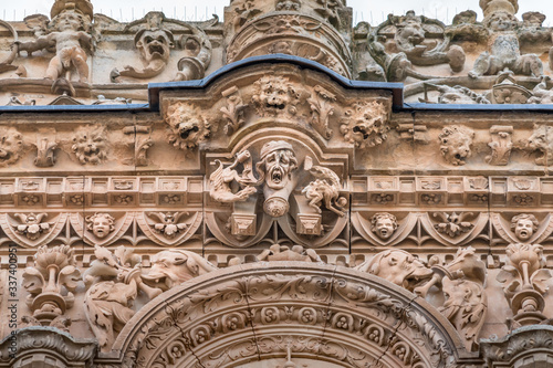 Plateresque style exterior facade of University of Salamanca. From patio de escuelas Square. UNESCO World Heritage Site. Salamanca, Spain.